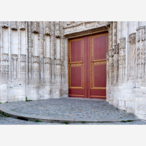 Stone and Crimson: The Intricate Portal of Rouen Cathedral